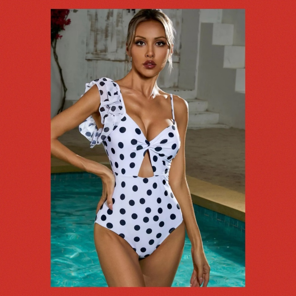 Black and white polka dot one piece swimsuit.